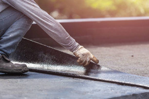 Professional Basement Waterproofing technician working in McEwen, TN